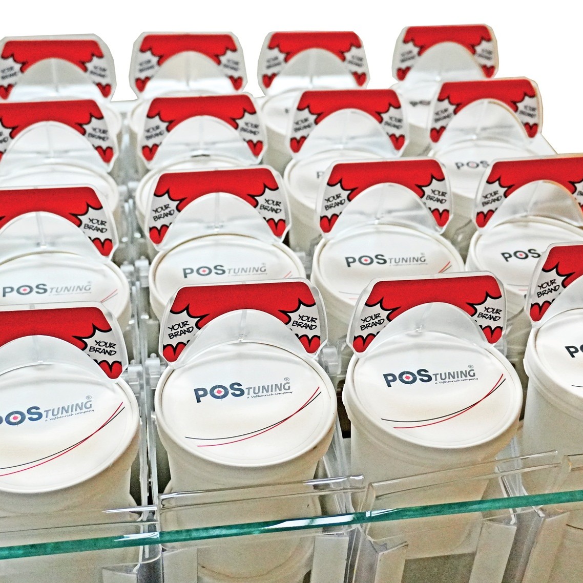 POS-T Skadi Lift ice cream cup display system installed in retail chest freezer — branded front panels facing shoppers