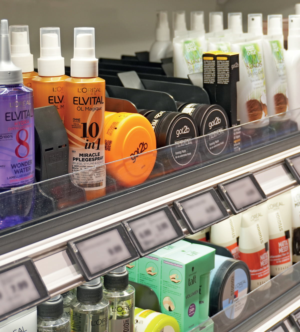 POS-T Vincent pusher system keeping health and beauty products perfectly front-faced on a gondola shelf